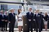 Sir Ben Ainslie, the Duchess of Cambridge, Sir Keith Mills and Sir Charles Dunstone flank the America’s Cup at the recent official launch – photo: Lloyd Images