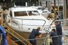 Boat builders busy in the Broom Boats workshop, as the company celebrated its 115th anniversary Photo: Steve Adams