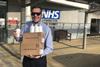Luke Machin, Berthon's marina manager donates the shipyard's supply of Molton Brown hand lotion to Lymington Hospital staff