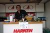 Andy Ash-Vie serves behind the bar at the legendary Harken UK annual party