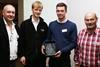 Paul Holland (left) and Tim Morgan (right) present the Apprentices award to Alexander Spencer and George Woollis