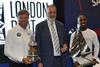 Alex-Thomson,-left,-and-Montel-Fagan-Jordan,-right,-receive-their-trophies-from-YJA-chairman,-Barry-Pickthall,-centre.-Photo-Chris-English.jpg
