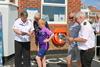 NCI Lee-on-the-Solent. Water safety officer Richard Harrison and watchkeeper Mary Thompson talking to the Glenister family about water safety. Photo credit Bev Livermore