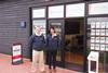 Geraint Skuse, manager and Georgie Eggleton, yacht broker outside the new flagship office at Chichester