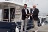 Francois Renault (left) hands the keys over to London 2012 sailing manager Rob Andrews