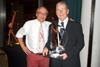 Peter Nash (left) presents Alan Morgan with his Lifetime Achievement Award