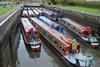 The whole 16 boat flotilla in the River Weaver's Dutton Lock - photo: Waterway Images
