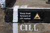 Lock cill positions are clearly marked on the coping stones or wall and accompanied by a warning sign – photo: Waterway Images