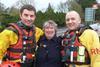 Mrs Glover meets the two men who saved her – photo: RNLI/Tamsin Thomas